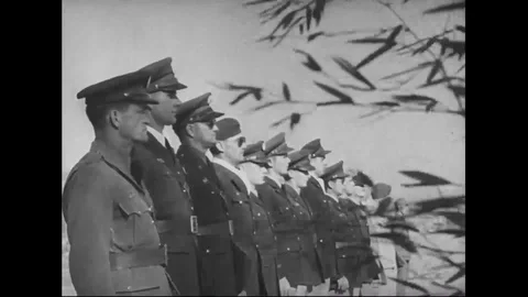 Fighter pilots pay tribute to the dead pilots during their funeral - 1941-1942 Stock Footage 101430460