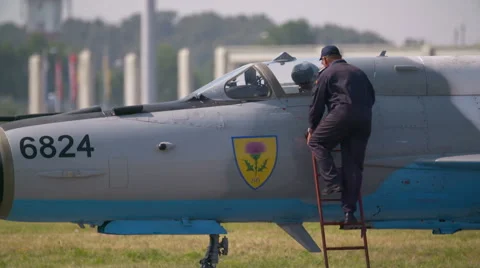 Fighter Pilots walking on tarmac Stock Footage 67338893
