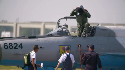 Fighter Pilots walking on tarmac Stock Footage 67339041