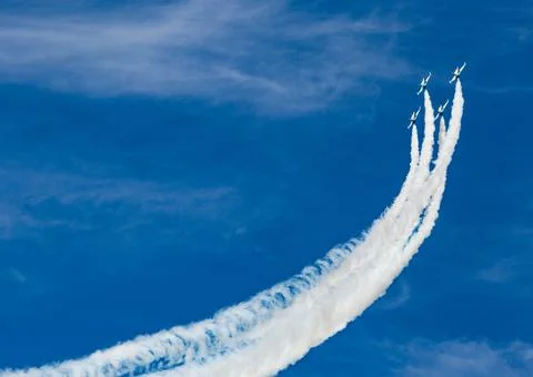 Fighter planes taking off and leaving a white trail Stock Photos