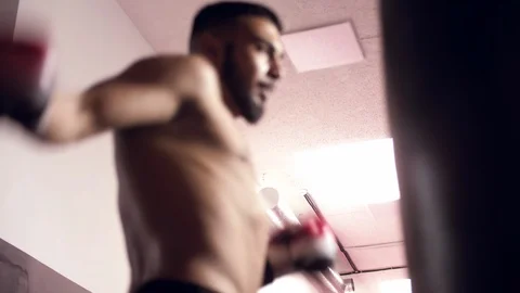 Fighter is practicing in boxing gym, Thai boxing, Martial arts Video stock 112056458