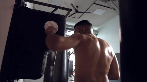 Fighter is practicing in boxing gym, Thai boxing, Martial arts Stock Footage 112057651