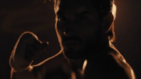 Fighter practicing his punches in the air Stock Footage 275083829