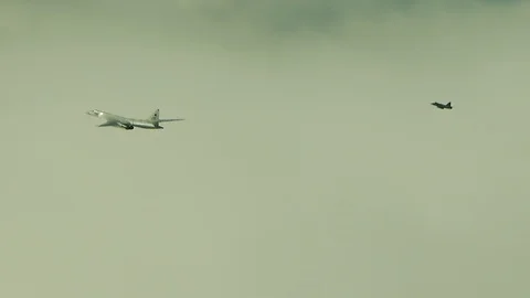 The fighter pursues the bomber Stock Footage 123050074