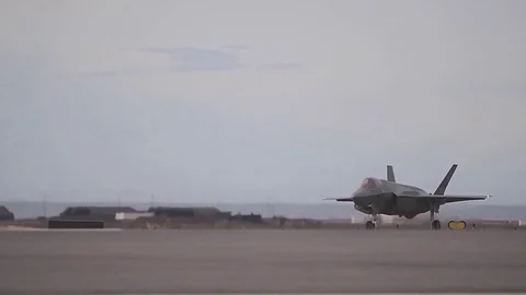 Fighter rides on runway to climb Stock Footage 120369504