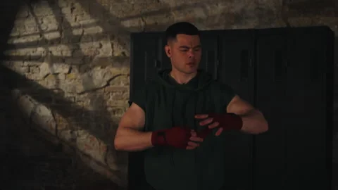 Fighter tightening hand wraps Stock Footage 306530198