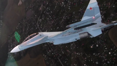 Fighter in a turn with a roll of 90 degrees Stock Footage 100373059