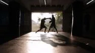 Fighters Muay Thai Boxing Training Silhouette Hitting Pads Slow-Motion Gym Stock Footage