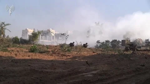 Fighting between the IDF and Hamas operatives continues in Gaza Stock Footage 258048683