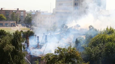 Fighting the fire and eliminating smoke on the smoky water after spraying Stock Footage 80257109
