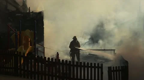 Fighting fire on playground Stock Footage 22196317