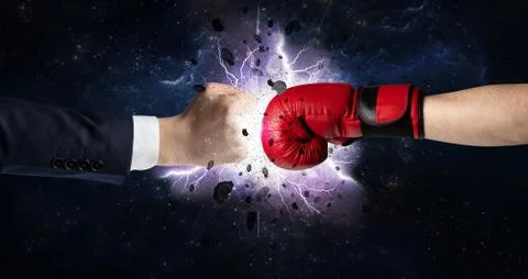 Fighting hands with storm explosion Stock Photos