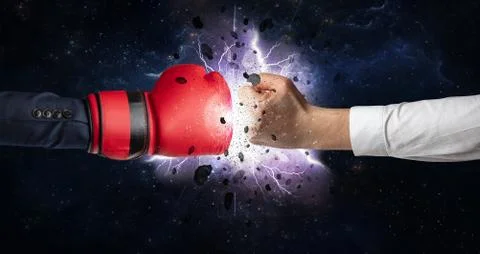 Fighting hands with storm explosion Stock Photos