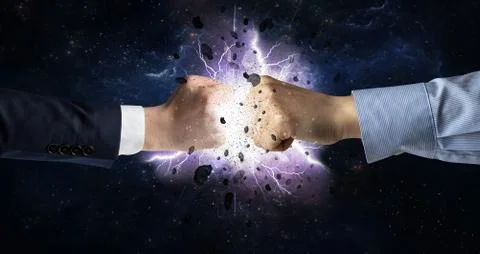 Fighting hands with storm explosion Stock Photos
