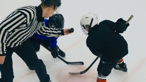 Fighting for the puck after face-off Stock Footage 111343947