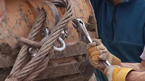 Fighting to Remove Jammed Shackle on Excavator Stock Footage 11016794