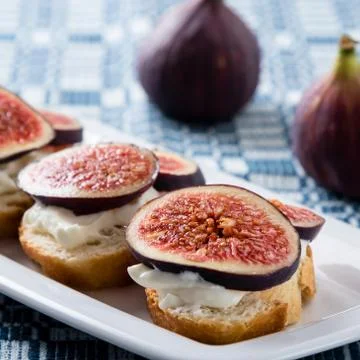 Figs with cheese Stock Photos