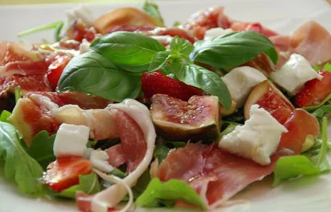 Figs with ham and rucola Stock Photos