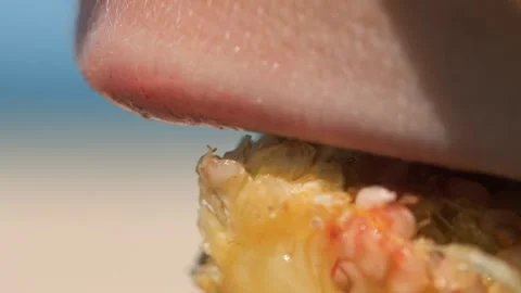 Figs in the hands of a man broken into two parts against the background of the Stock Footage 246823445