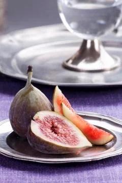 Figs on a silver plate Stock Photos