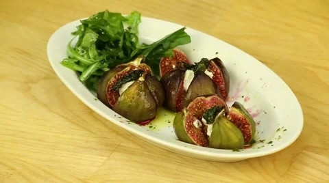 Figs stuffed with arugula Stock Footage 47866535
