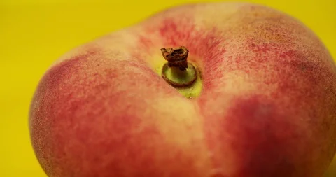 Figs on a yellow background rotates around its axis Stock Footage 112526855
