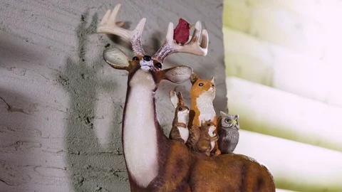 Figure of deer decorating the living room for Christmas. 4K Video stock 83402661