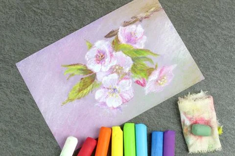 Figure drawn by wax crayons. Technique pastel. Multicolored crayons and a pictur Stock Photos