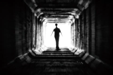 Figure at the end of the tunnel Stock Photos