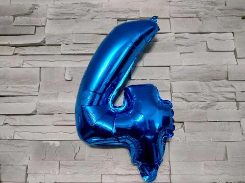 Figure four balloon on a wall Stock Photos