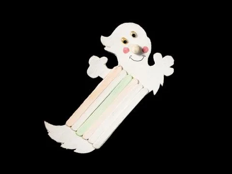 Figure of a funny white ghost made of wood by a child Stock Photos