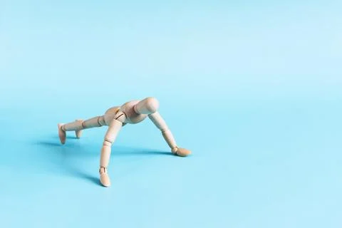 The figure of a man doing a physical exercise doing push-ups from the floor Stock Photos