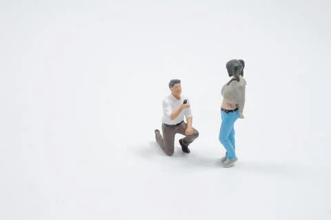 The figure man presents a ruby engagement ring, 스톡 사진