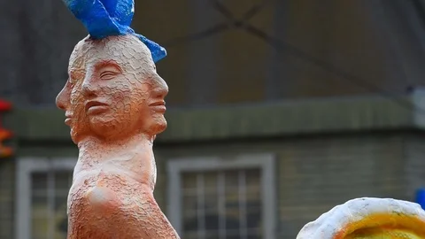 Figure with many faces in Prater, Vienna, Austria 스톡 동영상 110993045