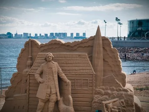 Figure of Peter I next to his first house in St. Petersburg Stock Photos