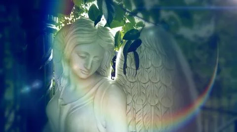 Figure of a praying angel Stock Photos