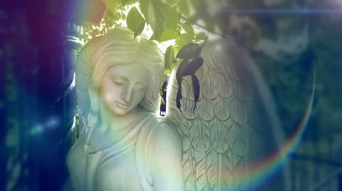 Figure of a praying angel Stock Photos