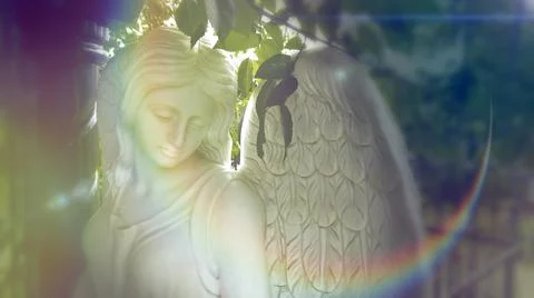 Figure of a praying angel Stock Photos