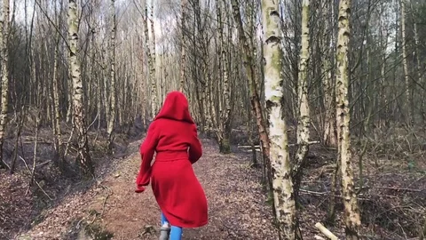 Figure in red running through Forest in slow motion Video stock 106593286