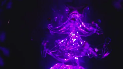 Figure of a rotating glowing Christmas tree Vídeo Stock 146635839