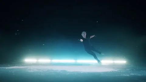 Figure skater is doing a jump in slow motion Video stock 156750832