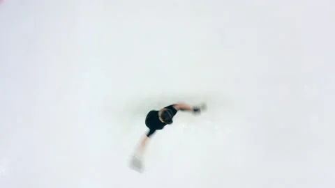 Figure skater is doing various spins on the rink while skating Stock-Footage 162053885
