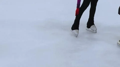 Figure skating lesson. Figure skaters training at the rink. Professional sports. Video stock 310351904