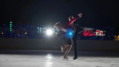Figure skating, young couple performs a dramatic dance on ice, professional Stock Footage 168881651