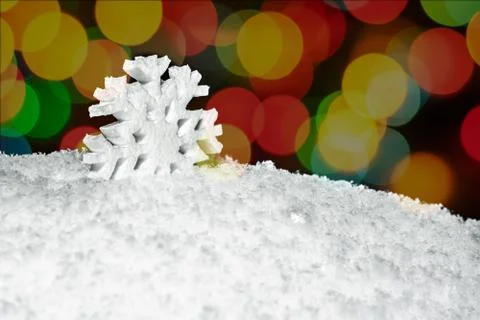 Figure snowflakes in the snow. Stock Photos