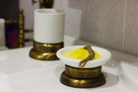 Figure soap in soap dish in elegant bathroom Stock Photos
