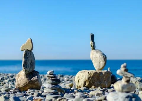Figure of stones on the beach Stock Photos