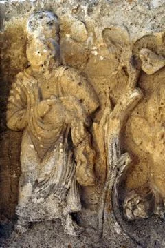 Figure on the wall Stock Photos