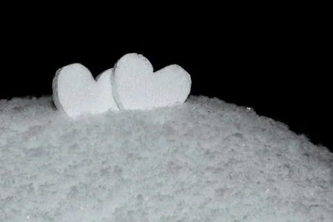 Figure white two heart on snow in a snowdrift Stock Photos