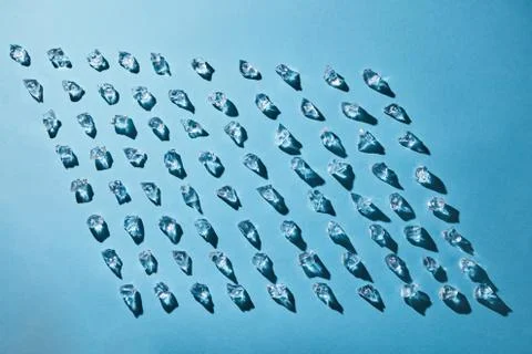 Figured pattern of ice cubes on a blue background 写真素材